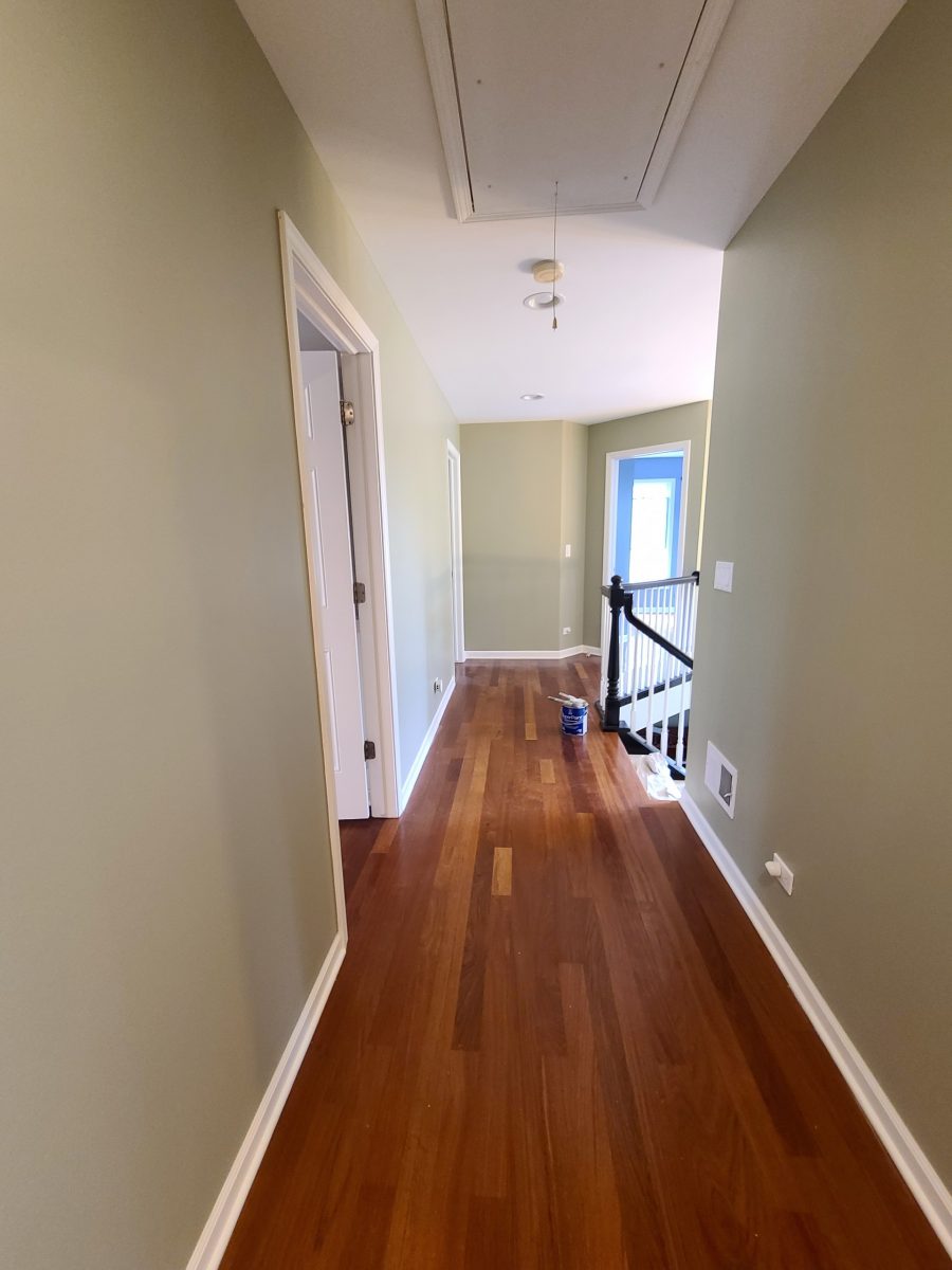 The upstairs hallways was painted a light beige. Preview Image 2