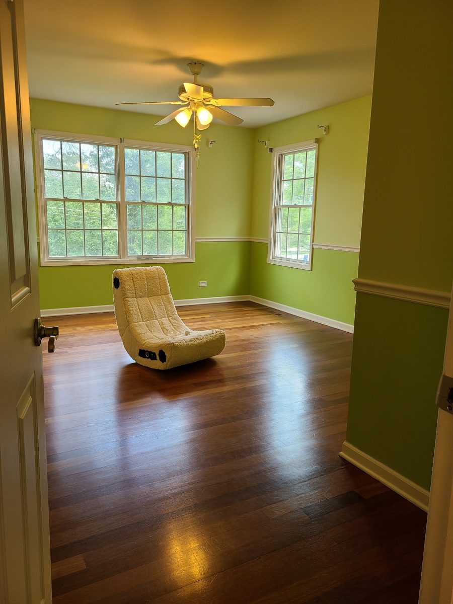 Bedroom painted a bright shade of green. Preview Image 6