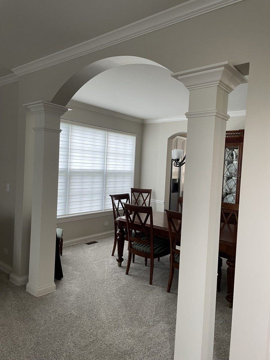 Dining room entrance with columns and trim painted white in Fox River Grove. Preview Image 2