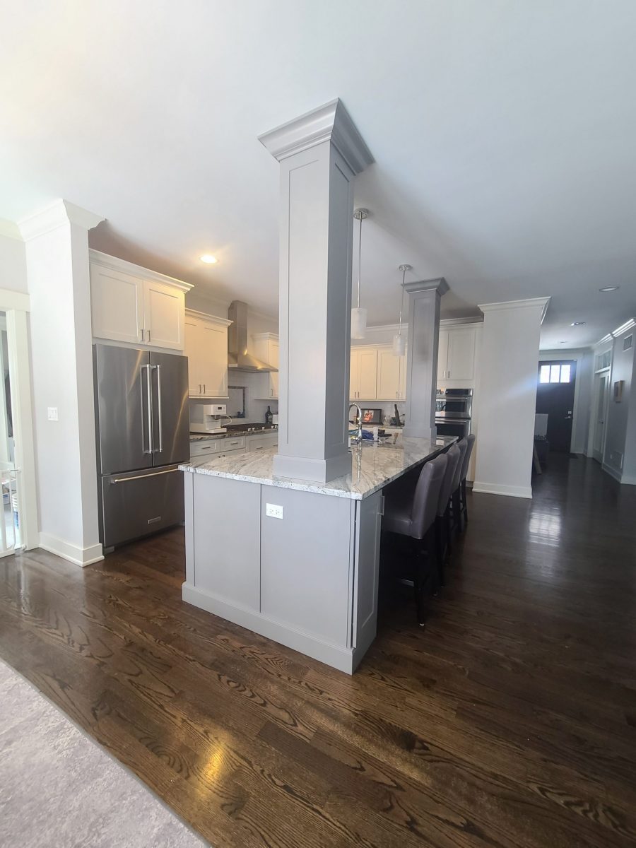 Kitchen cabinets painted gray and white. Preview Image 4