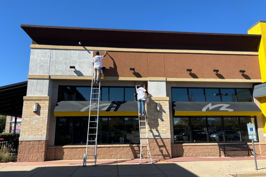 Retail Shops Case Study during photo of crew painting front of building Preview Image 7