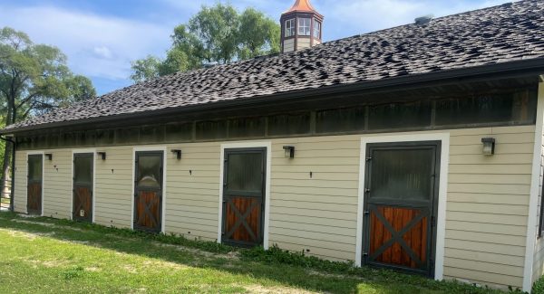 painted exterior of horse barn