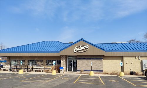 Commercial metal roof painting in Palatine.