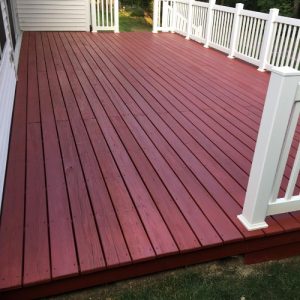 A semi transparent stain is applied to this house's deck