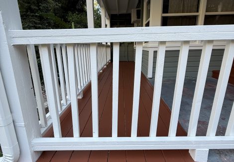 painted covered balcony of home