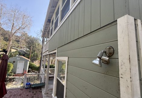 close up of exterior siding on house before painting