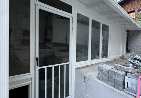 exterior door of house with white painted detail