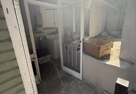 house exterior siding with damaged paint