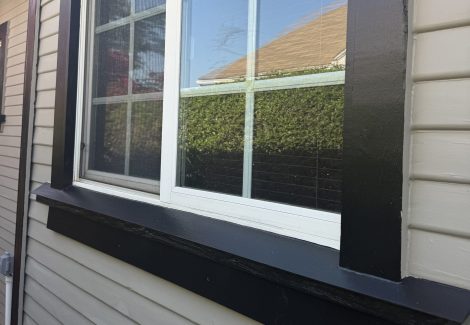 exterior view of house window with dark trim