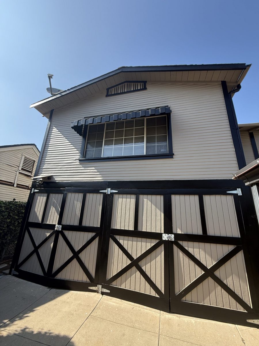 garage side of painted house with dark trim Preview Image 6