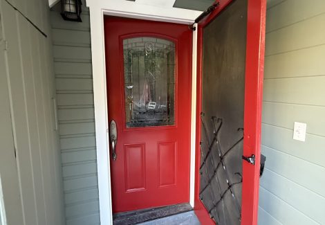 red painted door on home