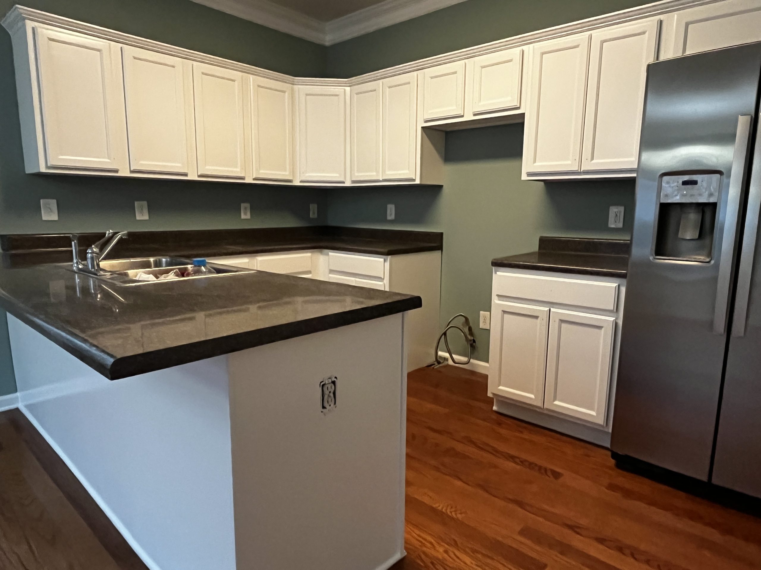Kitchen in Tyrone, GA, after completed residential interior and kitchen cabinet painting project by CertaPro Painters of Peachtree City/Coweta County, GA