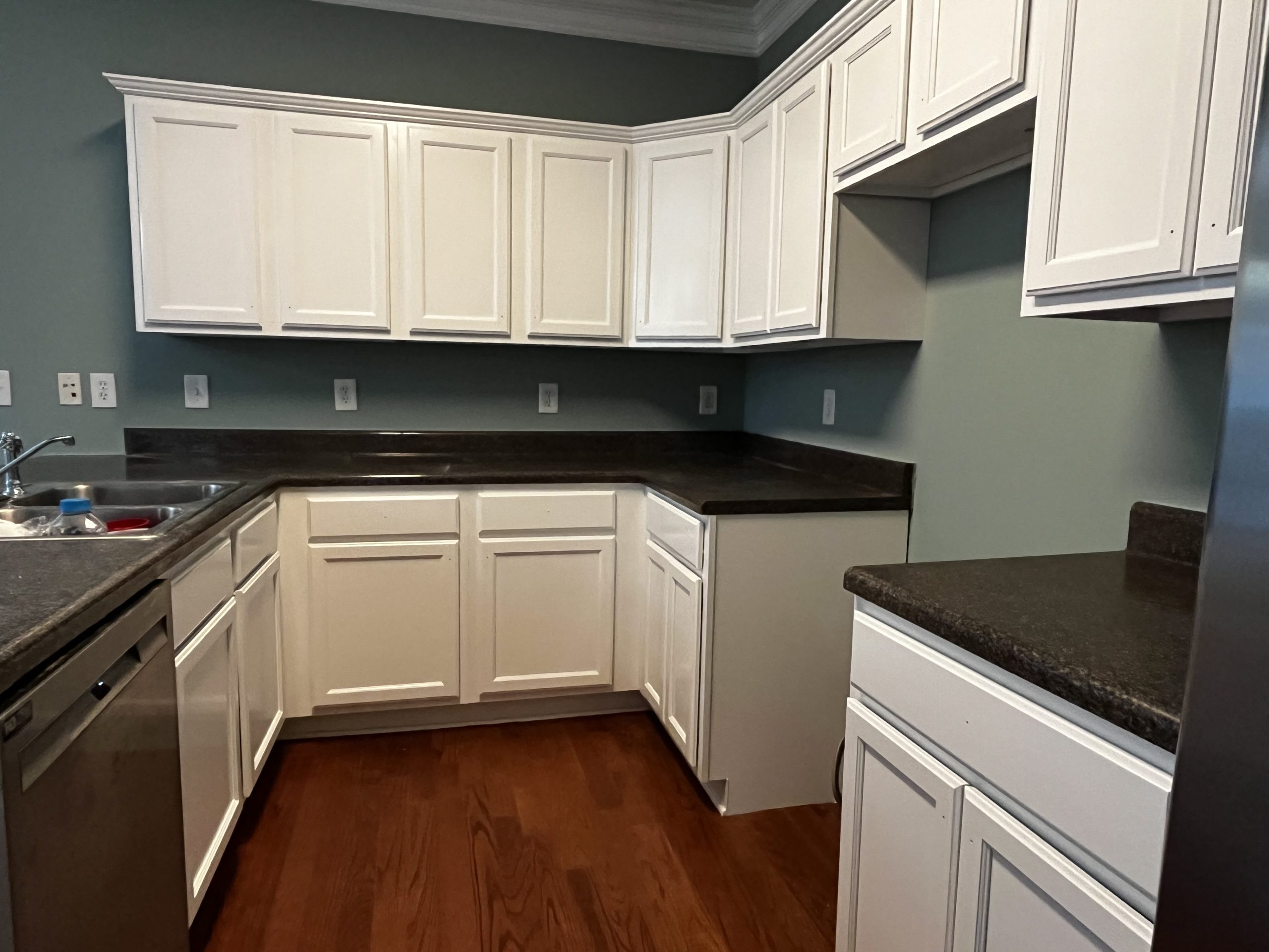 Kitchen in Tyrone, GA, after completed residential interior and kitchen cabinet painting project by CertaPro Painters of Peachtree City/Coweta County, GA - Angle 2