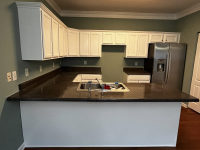 Kitchen in Tyrone, GA, after completed residential interior and kitchen cabinet painting project by CertaPro Painters of Peachtree City/Coweta County, GA - Angle 3