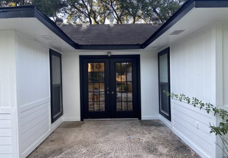 brick entry way white and black painting