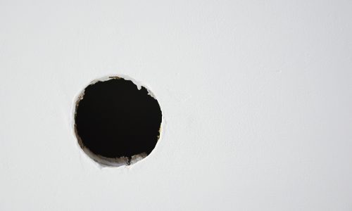 holes in drywall repaired before painting.