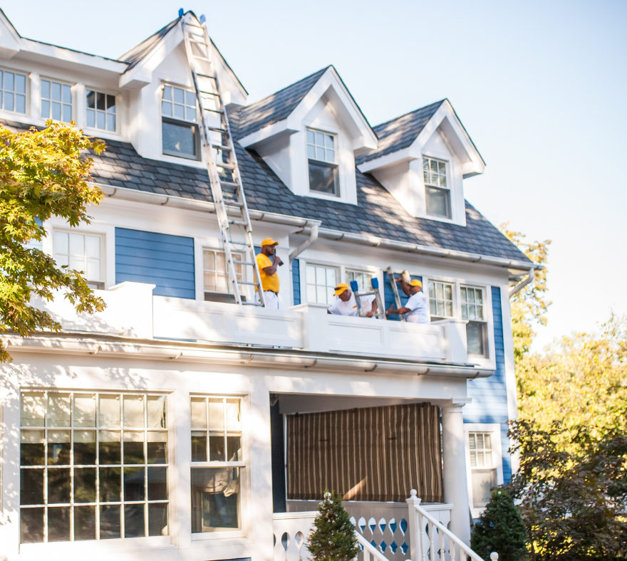 Blue siding exterior with certapro painters paint crew
