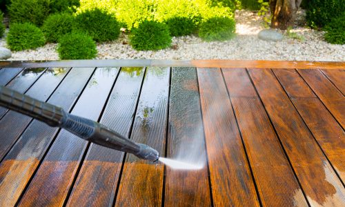 Power washing deck before staining