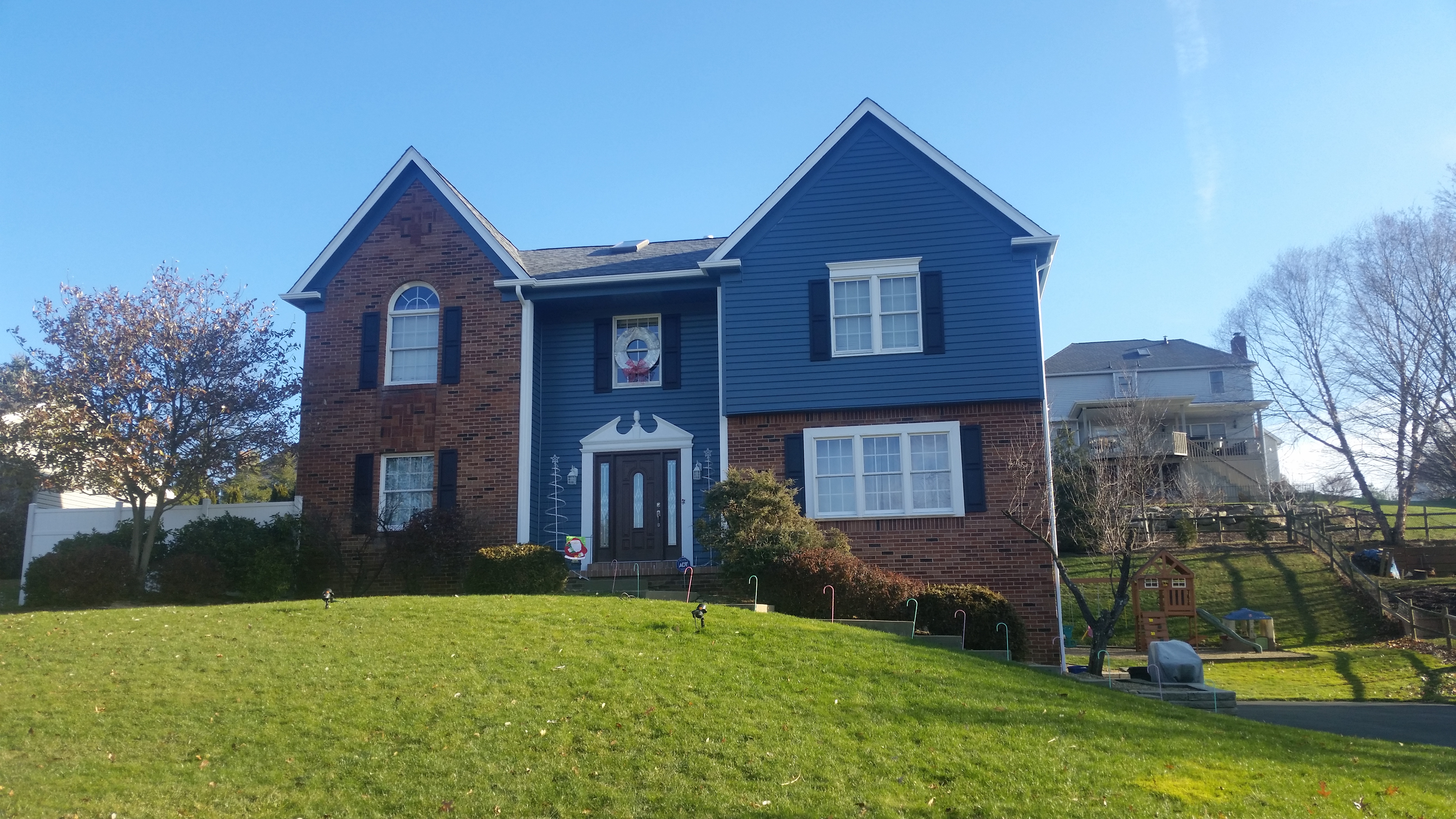 Exterior gable and trim painting in blue