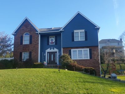 Exterior gable and trim painting in blue