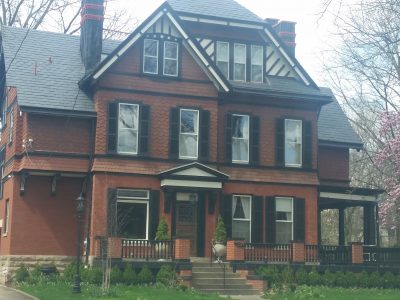 Exterior trim painting on brick exterior