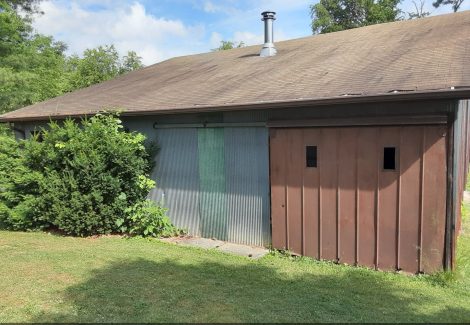 Garage exterior before restoration=