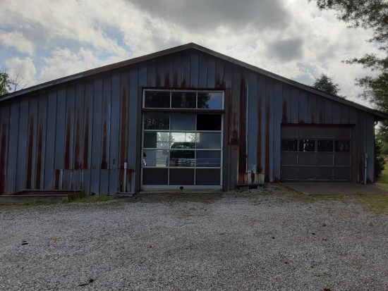Galvanized garage before revamp and repaint