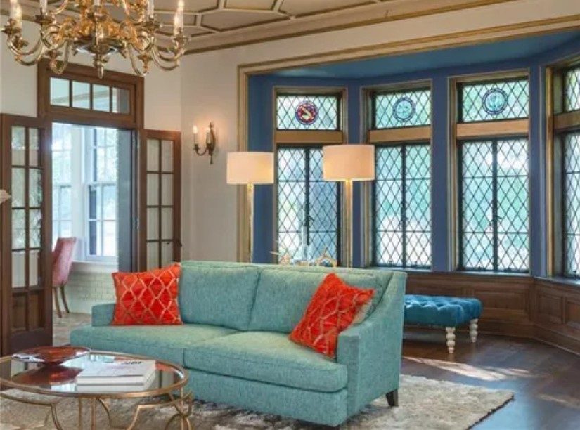 side view of blue couch with blue trimmed windows with diamond grid pattern Preview Image 9