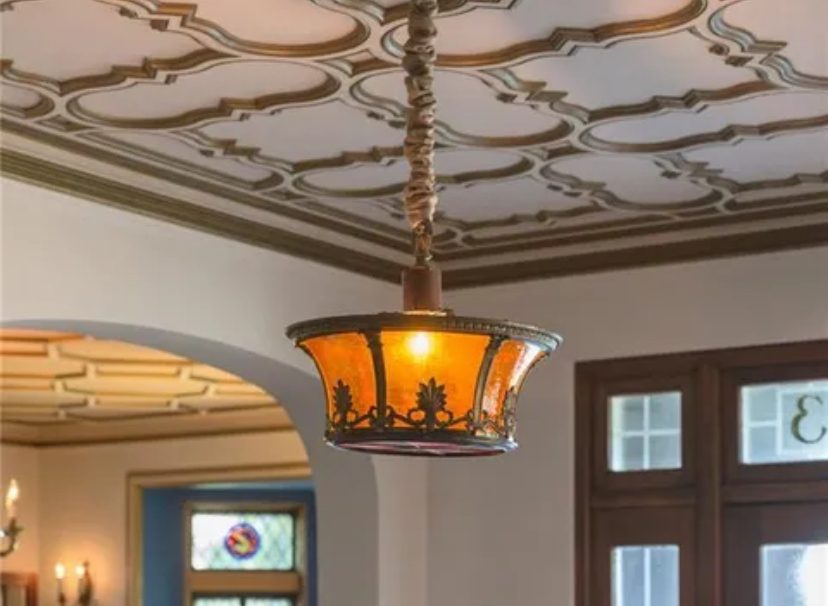 close up of patterned ceiling inlay with hanging light fixture Preview Image 11