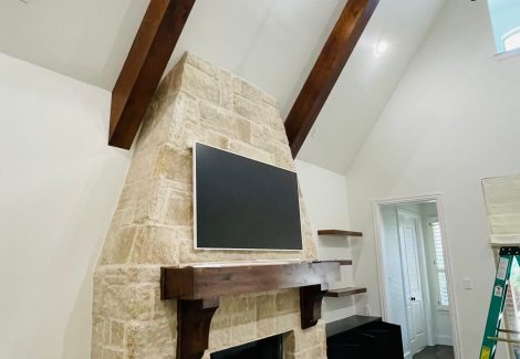 home fireplace with tv above mantle