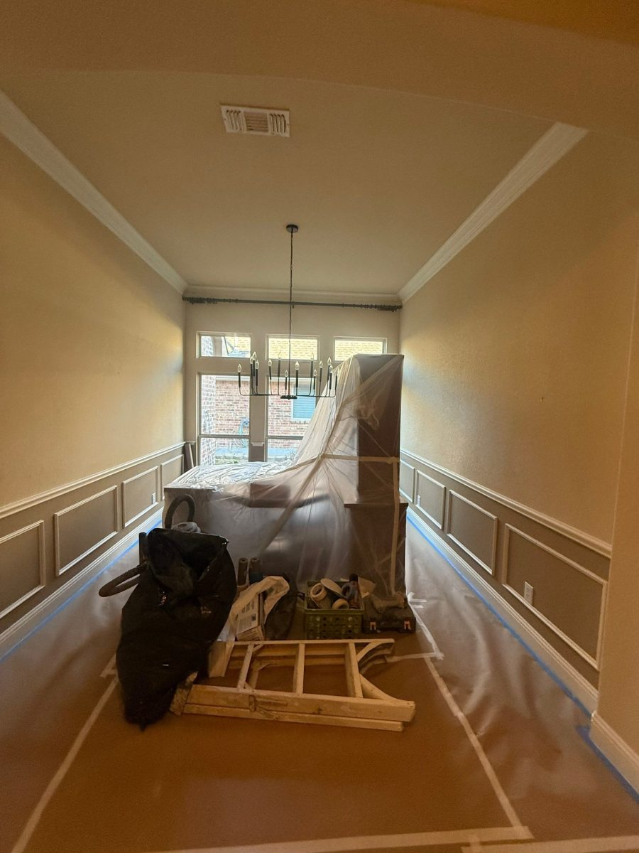 room in home with protective sheeting for painting Preview Image 5