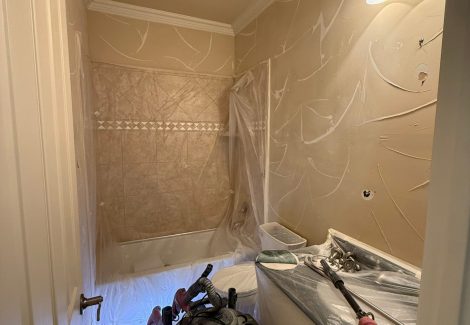 home bathroom with protective coverings for painting