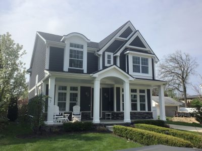 Exterior Painting of Navy house with White Trim