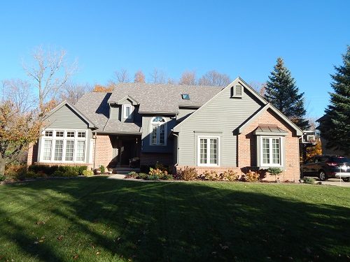 Exterior house painting by CertaPro painters in Plymouth, MI