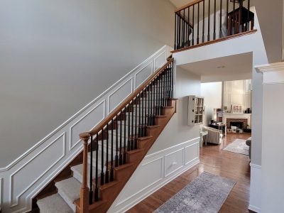 home staircase with spindles painted black