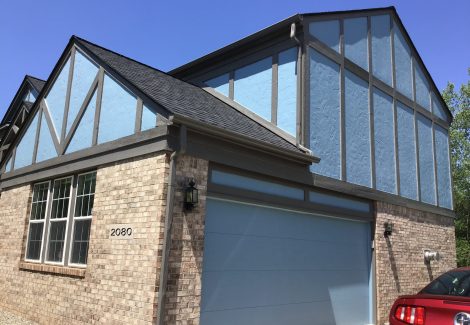 Side Profile of Tudor Style Home Repainted
