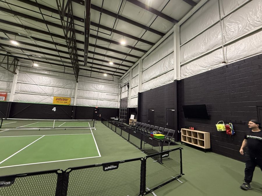 indoor pickleball court with black painted wall Preview Image 2