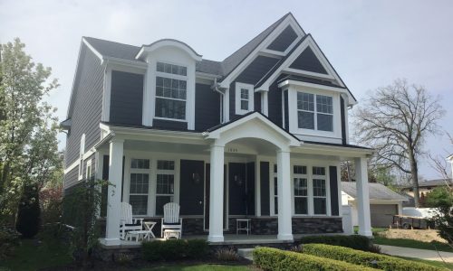 Exterior Painting of Navy house with White Trim