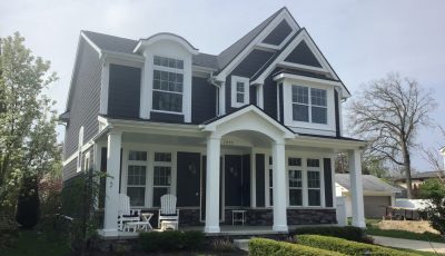 Exterior Painting of Navy house with White Trim