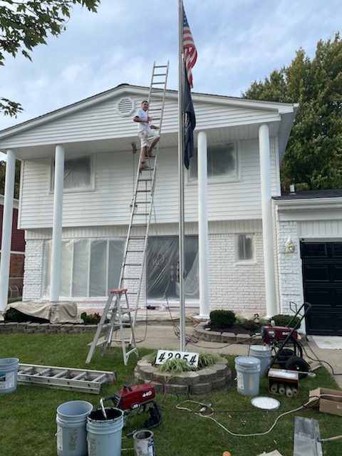Painted Brick with White Siding