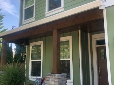 Porch and front of house in Beaverton painted green.