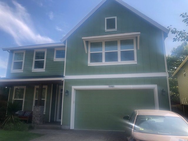Exterior of home painted green in Beaverton Oregon. Preview Image 1