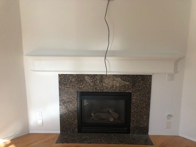 Fireplace mantel and wall painting. Preview Image 2