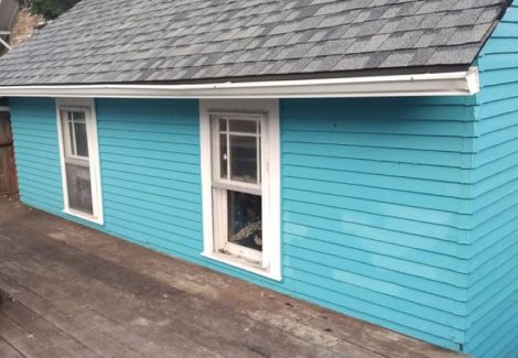 kenton home after paint job turquoise