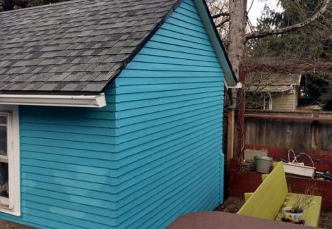 kenton home after paint job turquoise