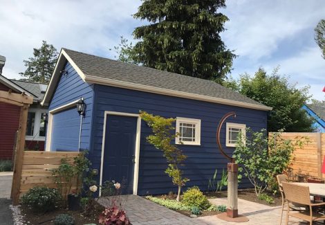 Exterior garage painting by CertaPro house painters in Portland, OR