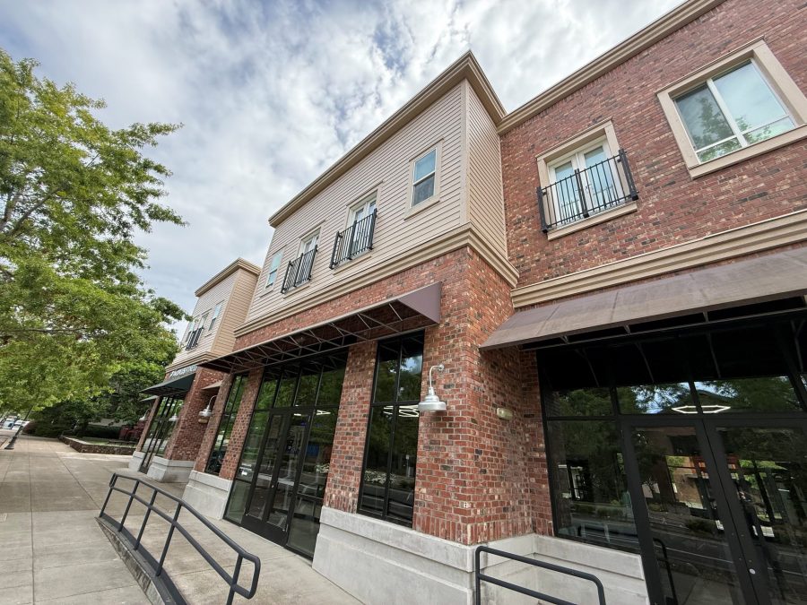 painted siding and brick retail and apartment buildings Preview Image 6