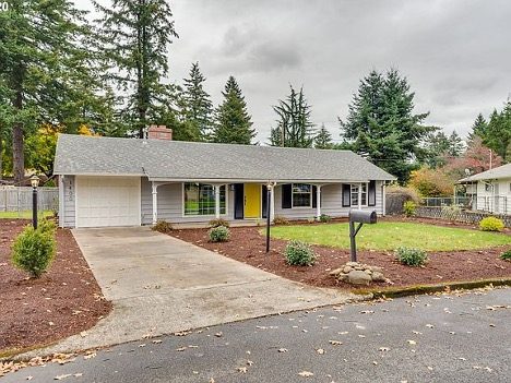 street view of house front with distinctive yellow door paint color Preview Image 2