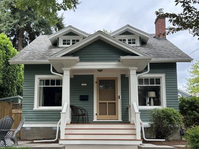 front of cottage with siding painted in "green smoke"