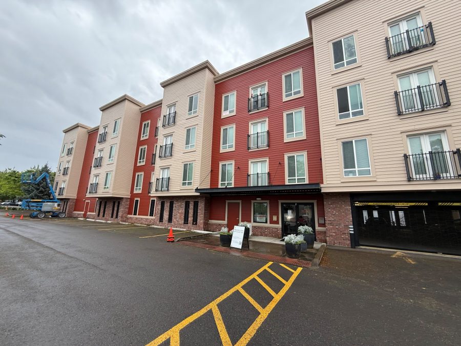 two-color painted siding and brick apartment buildings Preview Image 1